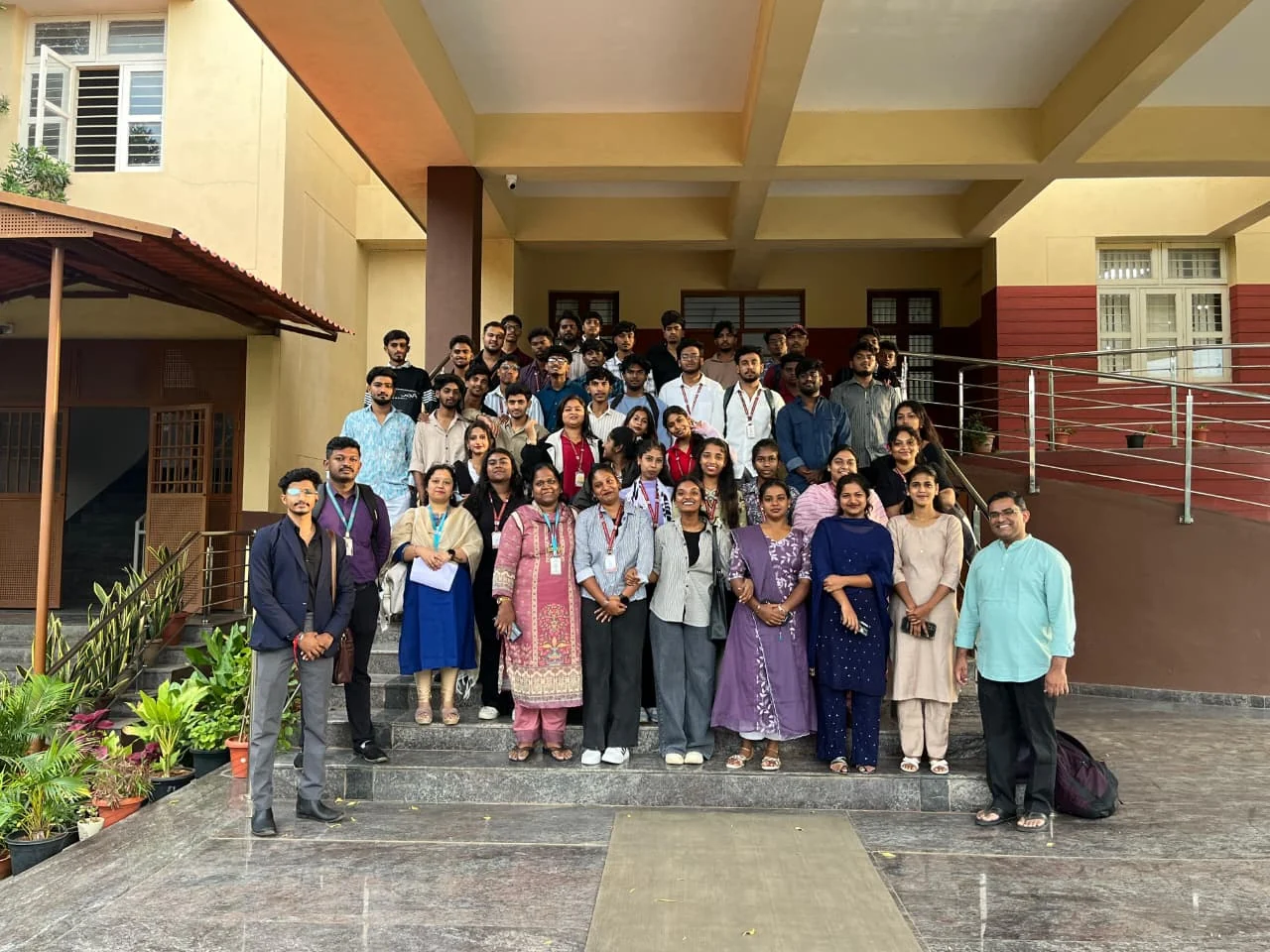 Students and educators together after a visit