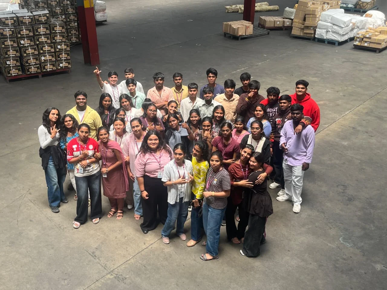 Students gathered inside a warehouse